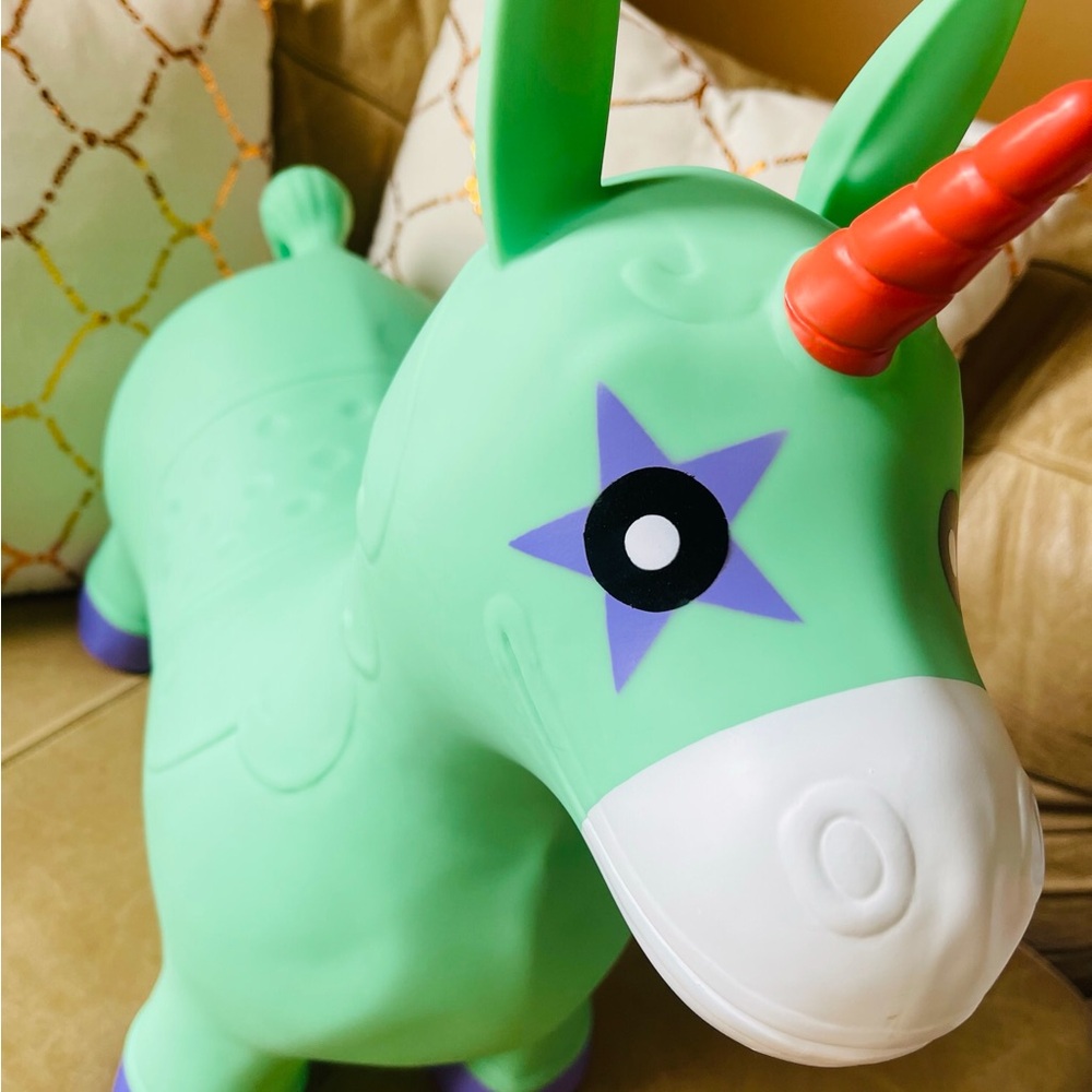 Silicone Green Unicorn Ride-On Hopper Toy with Orange Horn
